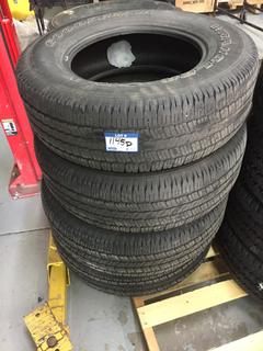 (4) Goodyear Wrangler P265/70R18 Tires.