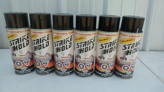 (6) 13oz Cans of Strike Hold Lubricant.