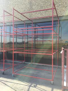 Rolling Metal Rack, 116"H x 66"D x 80"W.