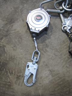 (2) Miller Harnesses. Rebel Ct Retractable Lifeline. Miller Soft Stop & Carabiner. Miller Black Rhino Retractable Lifeline.