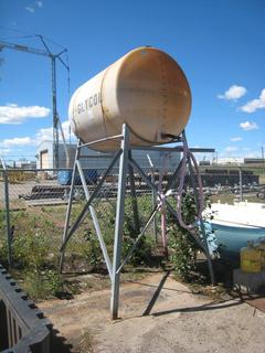 2200 Liter Gravity Tank. c/w Industrial Grade Spill Containment. (Approx.) 32"x93"x136" & 86"x72"x93" Tower. Note:  Buyer Responsible For Dismantling, Lifting & Loading. Items Must Be Removed by September 1, 2020, 4:00 PM.  Items Left Onsite After September 1, 2020 Will Be Considered Abandoned.