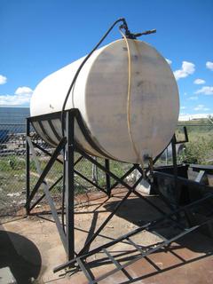 4700 Liter Gravity Tank. c/w Industrial Grade Spill Contiainment. (Approx.) 89"x84"x76" & 21"x117" Ladder. Note:  Buyer Responsible For Dismantling, Lifting & Loading. Items Must Be Removed by September 1, 2020, 4:00 PM.  Items Left Onsite After September 1, 2020 Will Be Considered Abandoned.