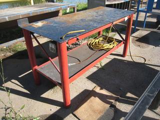 Table w/ Extension Cord. 38 x 73 x 31". 