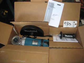 Unused 9" Makita Angle Grinder.