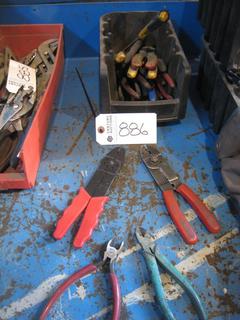 Bin of Electrical Stripping Pliers.