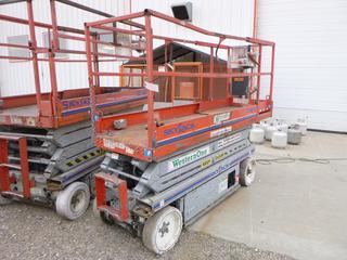 Skyjack SJW3220 Scissor Lift S/N 60000527. Note:  Key Broke In Ignition. Tested, moves in reverse but not forward. Buyer Responsible For Removal.