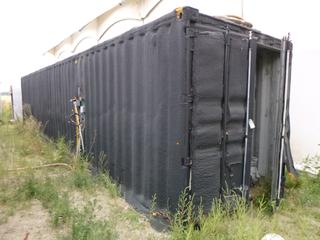 40' Storage Container c/w contents. Exterior Spray Insulated, Wired For Electrical. Note:  Buyer Responsible For any Dismantling, Lifting & Loading.  Electrical has been disconnected