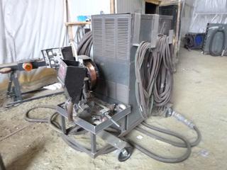 Lincoln Electric Arc Welder S/N AC528134 w/ Wire Feeder. Electrical has been disconnected