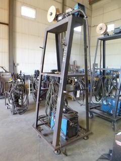 Miller XMT 350 Phase 1 and 3 Welder S/N LF089910 w/ Tall Cart, Cables, Contents, and Wire Feeder. 