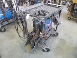 Miller XMT 350 Phase 1 and 3 Welder S/N LF11445H w/ Contents and Cart. 