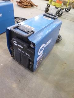 Miller XMT 350 Phase 1 and 3 Welder S/N ME179083U w/ Cable. 