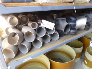 Shelf of Pipe Elbows. 