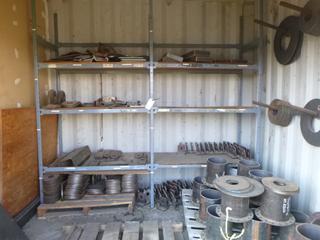 Contents of Seacan. Shelving Unit, Steel Plate, Brackets, Discs, Etc. 