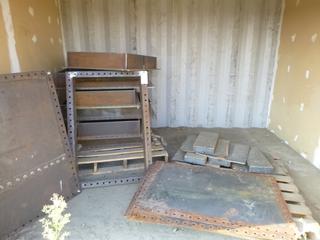 Contents of Seacan. Scrap Steel Plates, Frames, and Covers. 