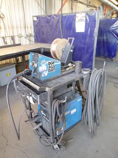 Miller Welding Cart w/ Wire Feeder and Accessories. 