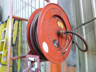 Air Hose and Reel. Buyer Responsible for Removal. 