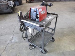 Lincoln Electric Cart and Wire Feeder w/ Contents. 