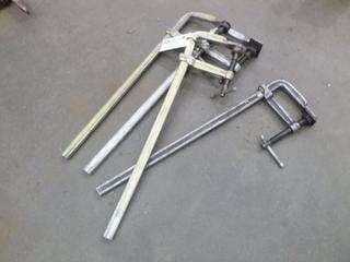 (4) 29" Bessey C-Clamps. 