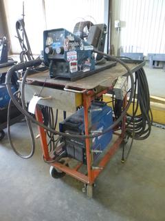 Miller XMT 350 Phase 1 and 3 Welder w/ Contents, Cables, and Wire Feeder. 