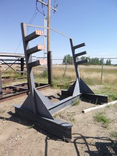 Metal pipe rack/stand. Approx 94" x 77" x 94". Buyer responsible for removal