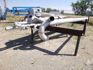 Metal rack/stand w/ contents. Approx 120" x 94" x 38" (rack). Stainless steel piping, various sizes. Buyer responsible for removal