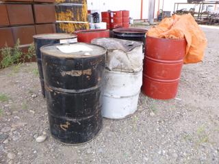 Qty of. Empty barrels w/ tarp