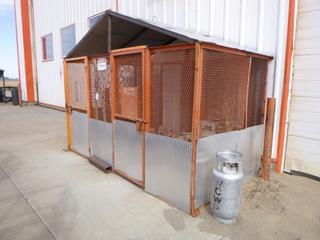 Shack/cage w/ contents. Approx 128" x 70" x 96". Bolted to ground, buyer responsible for removal