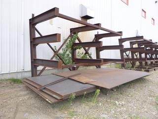 I-beam rack w/ contents. Approx 192" x 84" x 112" (rack). Approx 5/8" thick plate