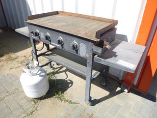 Blackstone flat top grill. Model: 1554. Cooktop approx 36" x 21". Comes w/ lockable casters