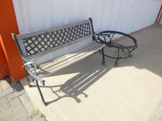 Wood bench w/ metal frame. Approx 50" x 18" x 29". Comes w/ coffee table (no top)