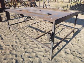 Custom steel table. Approx 84" x 60" x 40". Plate welded on top