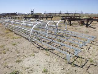 (3) ladders w/ safety cage. Approx 292" long