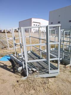 Metal platform w/ railing. Approx 84" x 46" x 60"