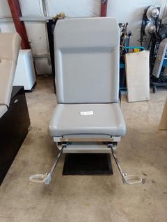 Electric Exam Table. c/w Stirrups, Foot Pedal Adjustment. Model# 5080-A, S/N 63336. Note:  No Forklift On Site, Buyer Responsible For Loadout.
