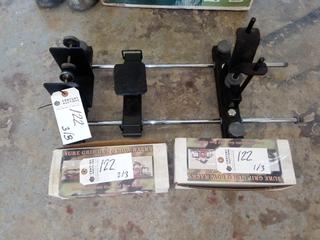 (2) Boxes Sure Grip Gun & Bow Rack. Table Top Sight for Rifles, 3 Pieces, Unused. Note:  No Forklift On Site, Buyer Responsible For Loadout.