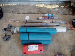 Quantity of Empty Welding Rod Tubes, Aluminum Wire, Tungsten Electrodes, Stainless Pipe. Note:  No Forklift On Site, Buyer Responsible For Loadout.