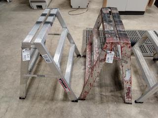 Pair of Aluminum Saw Horses. 35" Height. Note:  No Forklift On Site, Buyer Responsible For Loadout.