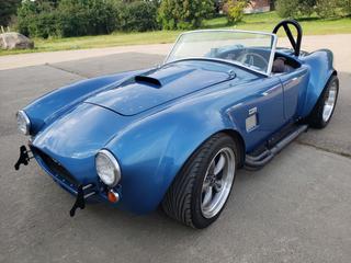 1966 Ford Shelby Cobra Mark II Roadster Kit Car Assembled by Factory Five Racing in 2004 C/w 302 CI 5.0L Gas, 4Spd Manual, Side Pipe Exhaust, 245/45 R17 Front And 315/35 R17 Rear. Showing 496 Miles. VIN MVIN235186IND *Note: Sold Bill Of Sale, Import Documentation and USA Title Owner Will Complete Importation for New Buyer After Sale*