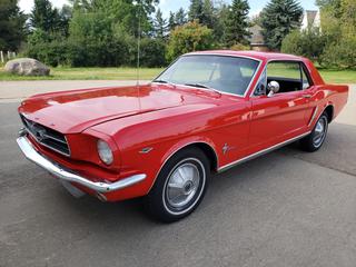 1965 Ford Mustang C/w 289CI V8, 3-Spd Auto Floor Shifter, Bucket Seats, Aluminum Radiator, Dual Exhaust, Frame Off Restoration And "C" Code (As Per Owner), 195/75 R14 Front And 195/75 R14 Rear. Showing 24,440 Miles. VIN 5F07C307583
