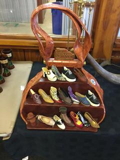 Just The Right Shoe Accessories Stand with Ceramic Shoes.