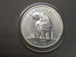 2011 Canada One Ounce .9999 Fine Silver Five Dollar Wolf Coin.