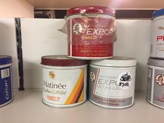 (1) Macdonald Export Mild, (1) Matinee Extra Mild, (1) MacDonald Export Extra Light tobacco Cans.