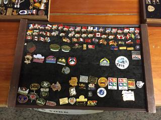 Quantity of Assorted Pins on Board.