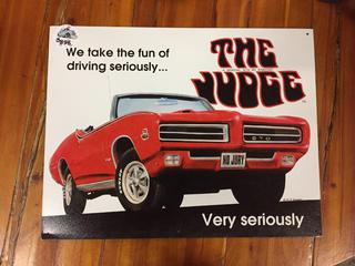 The Nudge GTO by Pontiac Sign.