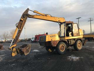 Selling Off-Site - Case 1085B Cruz-Air Wheel Excavator c/w Swivel Bucket. S/N 6293926 Located at 5717 - 84 Street SE Calgary, AB Call Johnnie 403-990-3978 For Further Information and Viewing. 