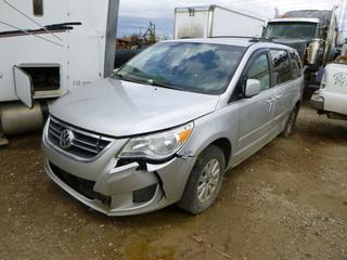 2009 VW Routan Van C/w 4.0L, A/T. VIN 2V8HW34X09R579301 *Note: Unable To Verify Mileage, CV Axle Issue, Flat Tires, Damage On Outside, Buyer Responsible For Load Out*