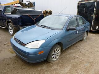 2001 Ford Focus Sedan C/w 2.0L, 5spd Manual. VIN 1FAFP33P81W135733 *Note: Running Condition Unknown, Flat Tires, Buyer Responsible For Load Out*