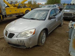 2005 Pontiac G6 4-Door Sedan C/w 3.5L, V6, A/T. VIN 1G2ZG528254118087 *Note: Running Condition Unknown, Flood Damage, Front End Damage, Rust, Rear Bumper Damage, Scrape On Driver Side, Buyer Responsible For Load Out*