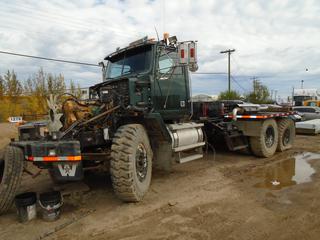 2005 Western Star Truck Tractor C/w A/T, 22,600lb Fronts, 100,000lb Rears, Planetary Rear Axles, Holland 50-Ton Fifth Wheel. VIN 5KJJASAVX5PN74954 *Note: Engine Removed, Parts Only, Buyer Responsible For Load Out*