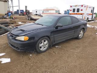 2003 Pontiac Grand Am GT Coupe c/w 3.4L V6, Showing 218,507 Kms, A/C, Fully Loaded, Leather, Power Sunroof, P225/60R16 Tires, VIN 1G2NV12E43C280213 *Note: Driver Handle Damaged, Minor Rust* (E. Fence)